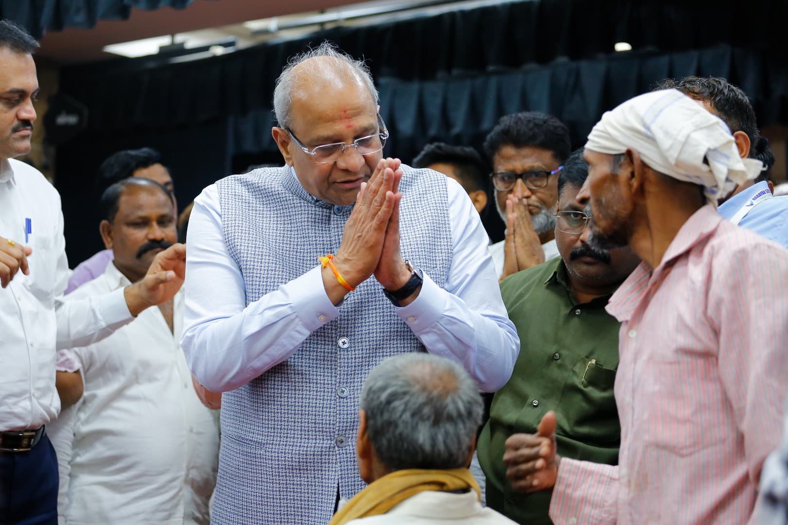Bhupeshbhai greeting residents with folded hands